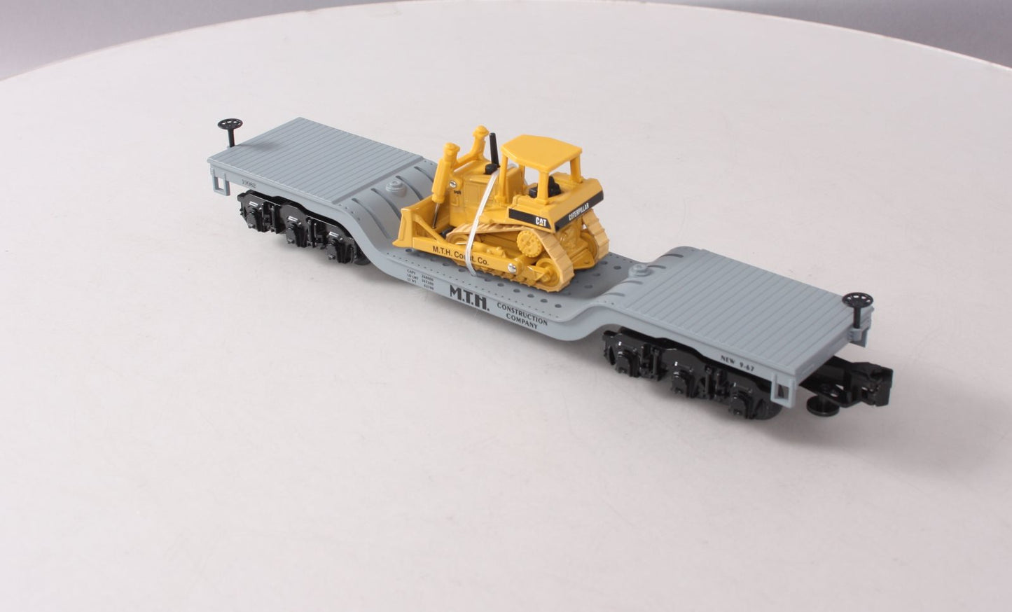MTH 30-7618 O Gauge MTH Depressed Center Flatcar #19982 with Ertl Bulldozer NIB