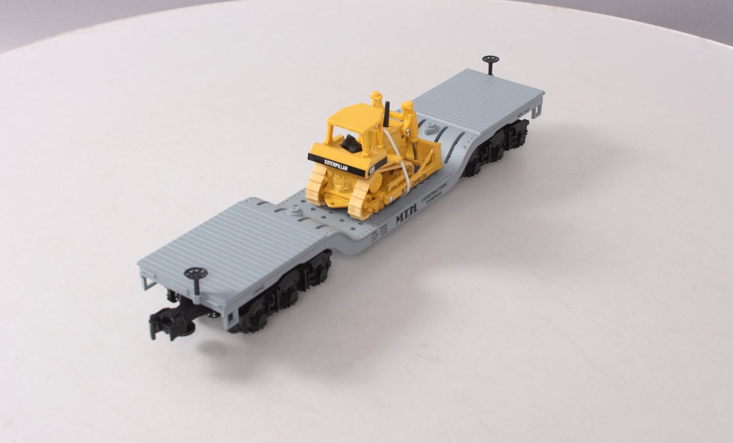 MTH 30-7618 O Gauge MTH Depressed Center Flatcar #19982 with Ertl Bulldozer NIB