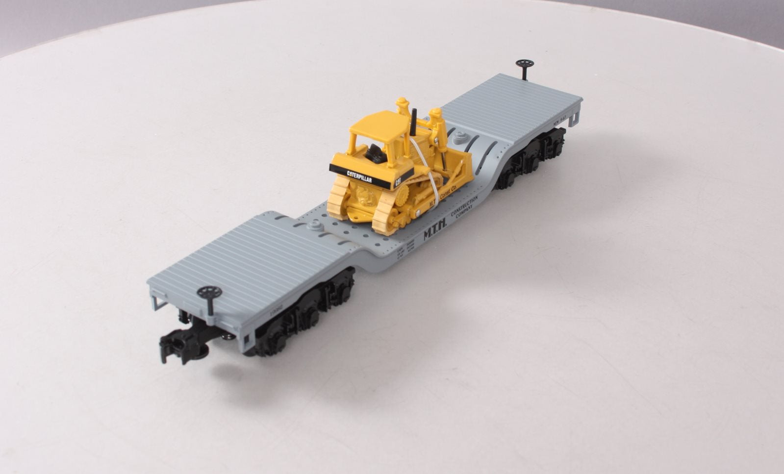 MTH 30-7618 O Gauge MTH Depressed Center Flatcar #19982 with Ertl Bulldozer NIB