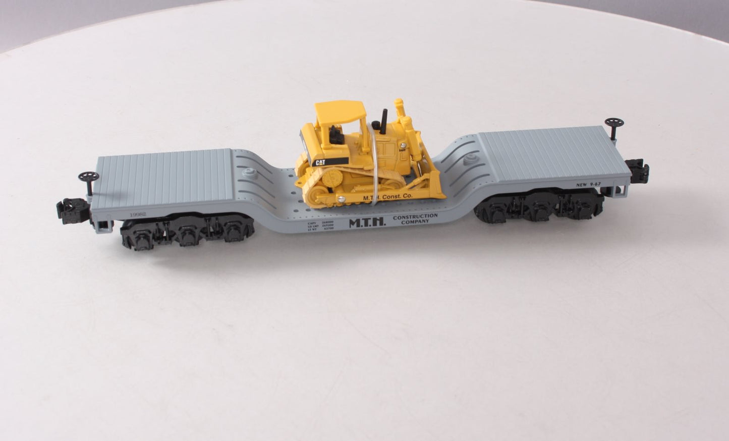 MTH 30-7618 O Gauge MTH Depressed Center Flatcar #19982 with Ertl Bulldozer NIB