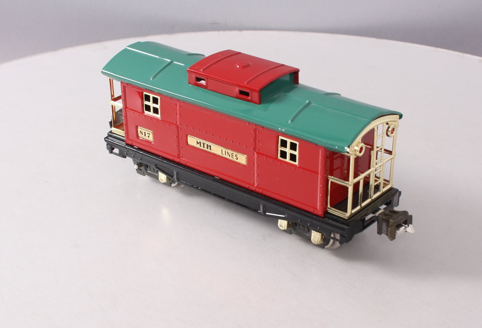 MTH 10-1042 O Gauge 817 Red & Peacock Roof Caboose w/ Brass Trim LN/Box