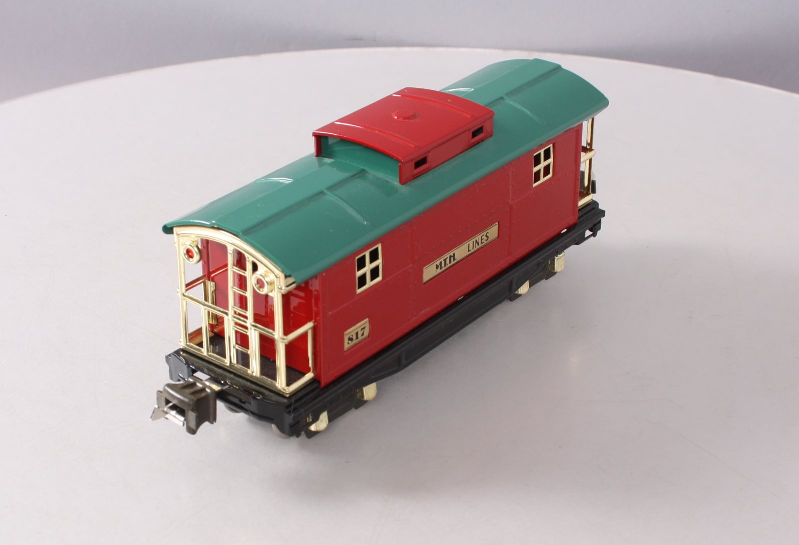 MTH 10-1042 O Gauge 817 Red & Peacock Roof Caboose w/ Brass Trim LN/Box