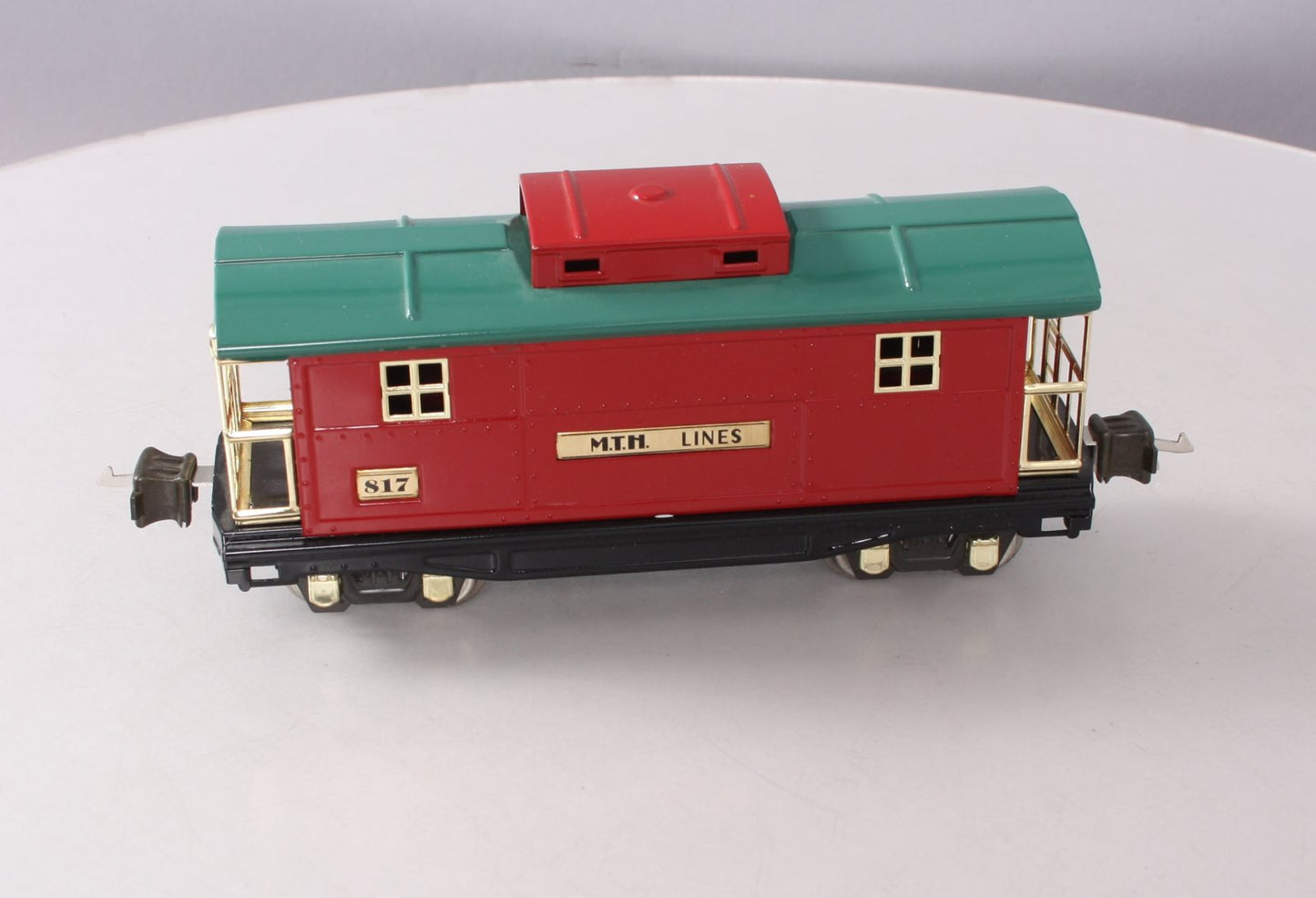 MTH 10-1042 O Gauge 817 Red & Peacock Roof Caboose w/ Brass Trim LN/Box