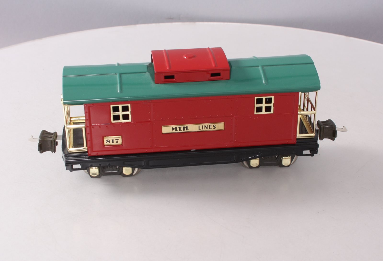 MTH 10-1042 O Gauge 817 Red & Peacock Roof Caboose w/ Brass Trim LN/Box