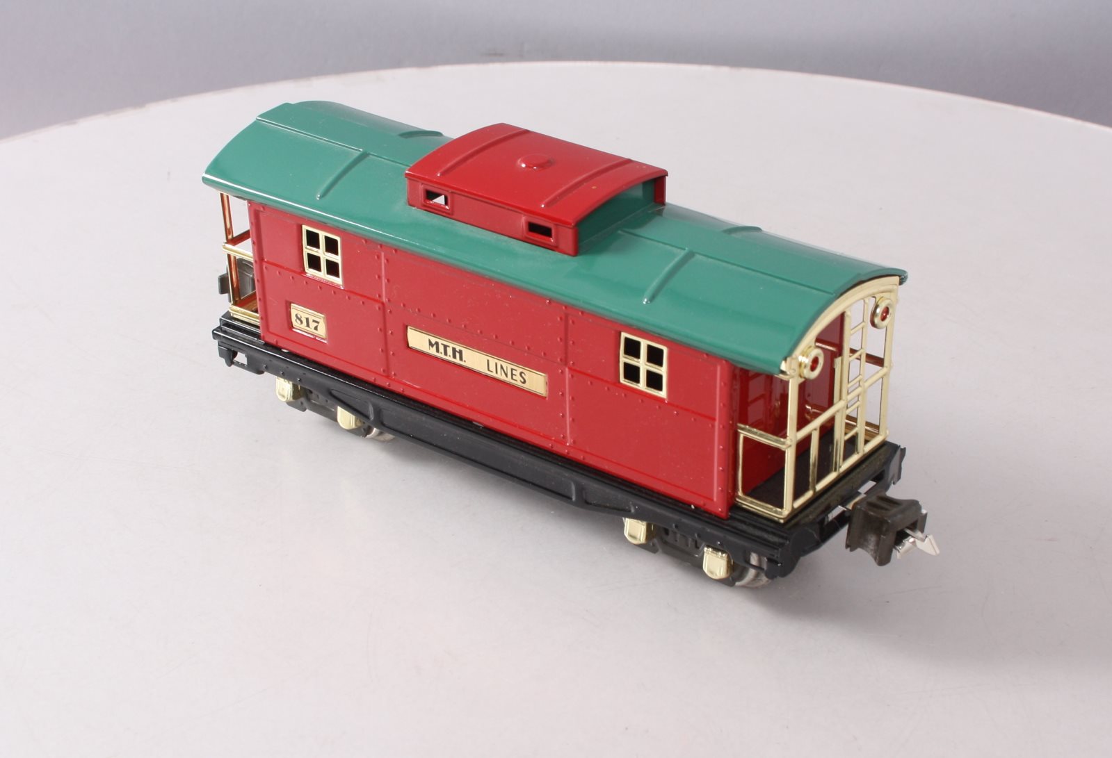 MTH 10-1042 O Gauge 817 Red & Peacock Roof Caboose w/ Brass Trim LN/Box