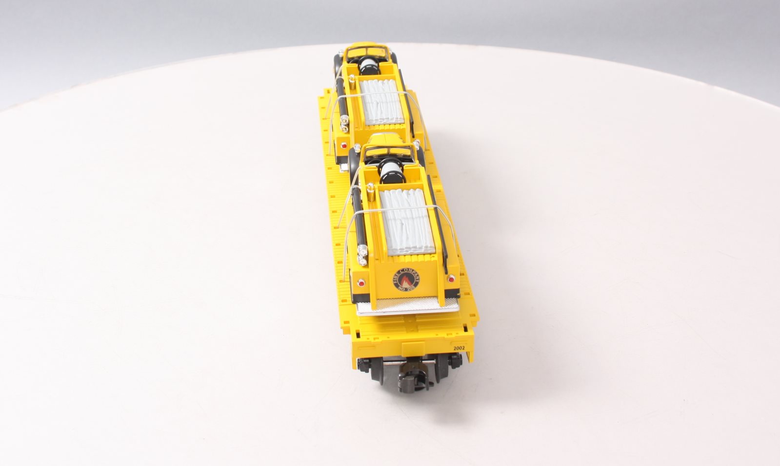 MTH 20-98159 O Gauge MTH Transportation Co Flatcar w/ Yellow Diecast Firetrucks LN/Box
