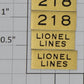 Lionel 218-20 Brass Lionel Lines and Number Plates (Set of 4)
