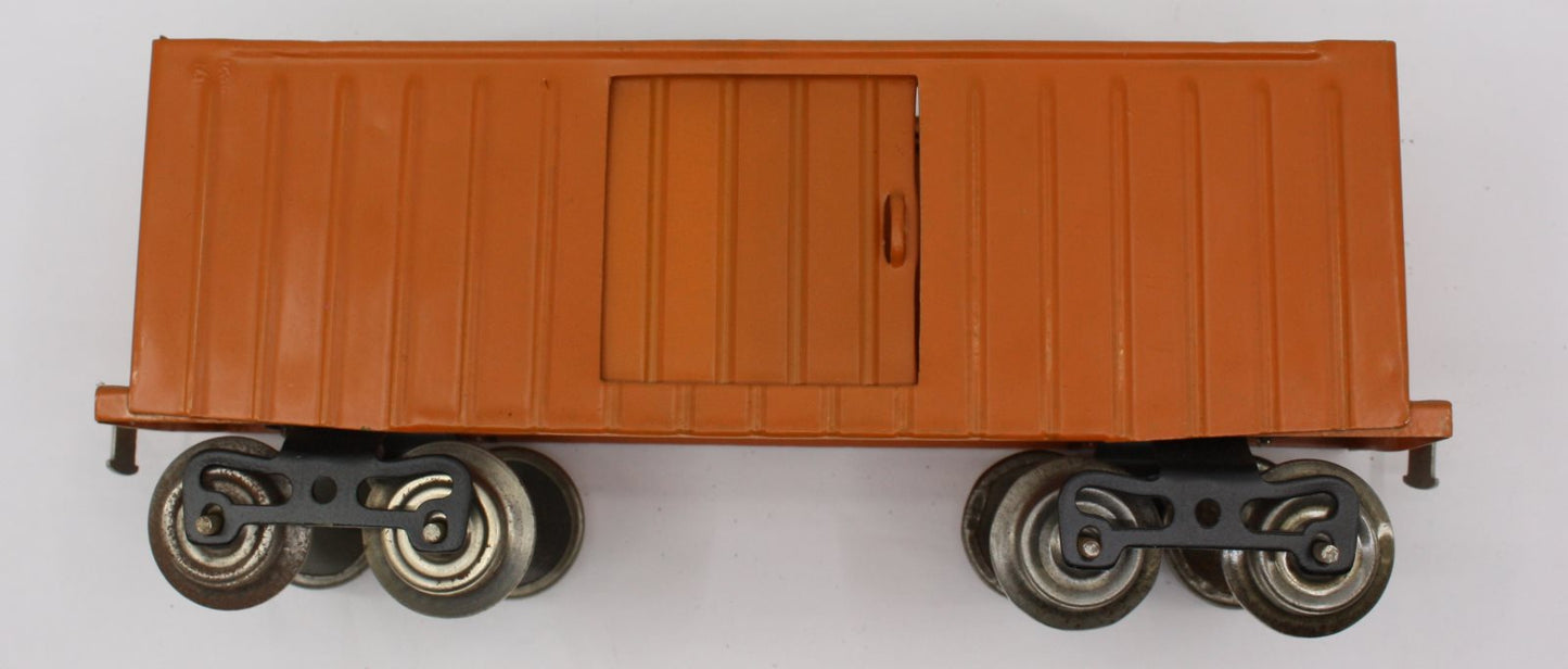 Lionel 114-1 Burnt Orange Freight Car with Door and Trucks-Incomplete