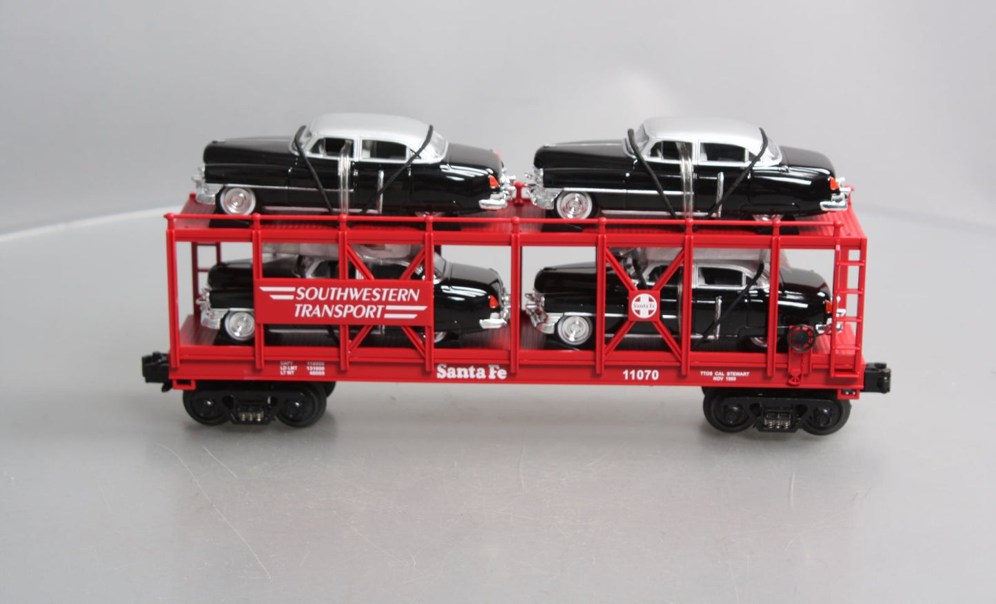 MTH 30-7659 O Gauge T.T.O.S. 1999 Auto Carrier w/ERTL 1952 Cadillac's #11070 NIB