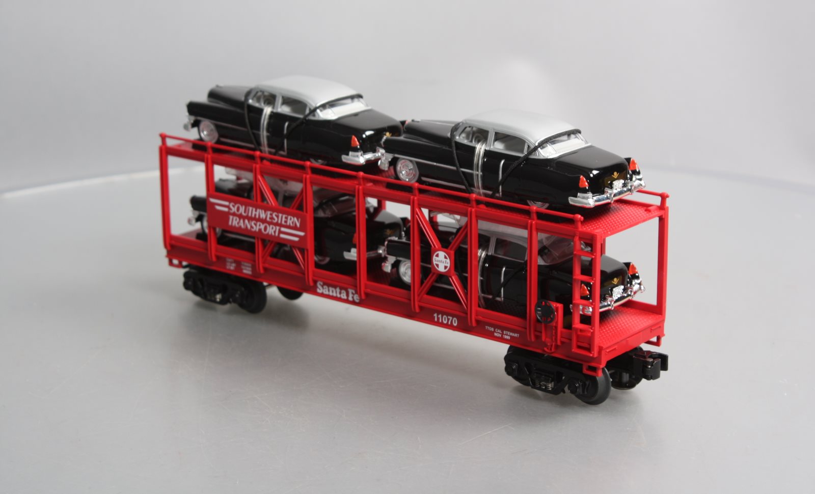 MTH 30-7659 O Gauge T.T.O.S. 1999 Auto Carrier w/ERTL 1952 Cadillac's #11070 NIB