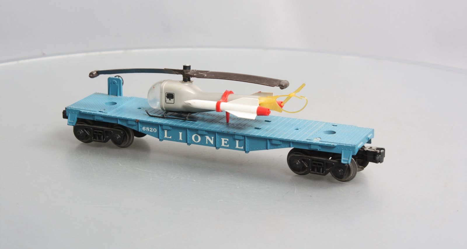 Lionel 6820 Vintage O Flatcar w/ Helicopter & Rockets
