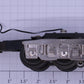 Lionel 29087-100 6-Wheel Passenger Truck with Collector and Platinum Sides