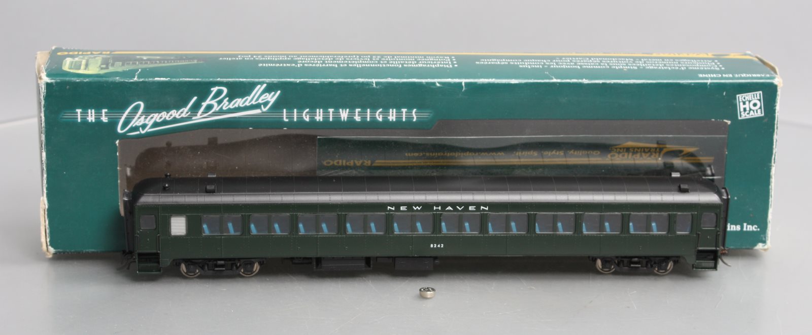 Rapido Trains 109126 HO New Haven 10-Window Coach, No Skirt #8242 (401 Green)