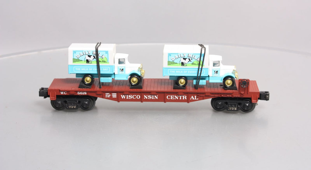 MTH 30-76116 O Gauge Wisconsin Central Flatcar With 2 Dairy Trucks  #5618 LN/Box
