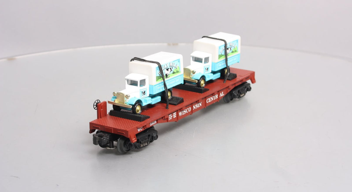 MTH 30-76116 O Gauge Wisconsin Central Flatcar With 2 Dairy Trucks  #5618 LN/Box