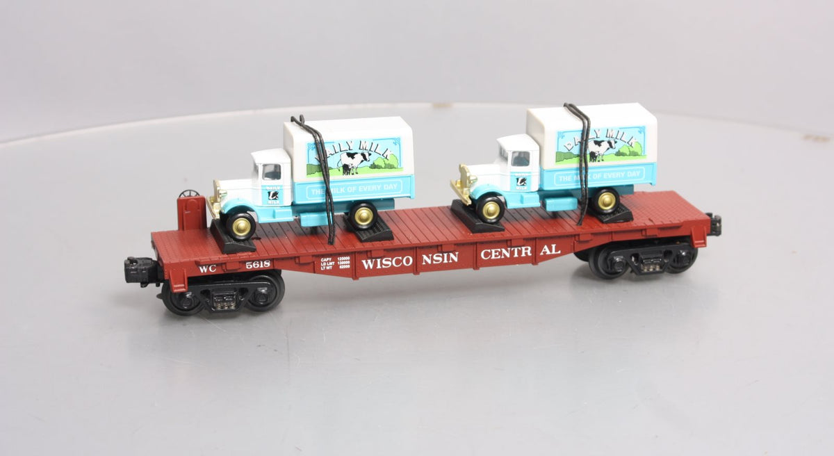 MTH 30-76116 O Gauge Wisconsin Central Flatcar With 2 Dairy Trucks  #5618 LN/Box