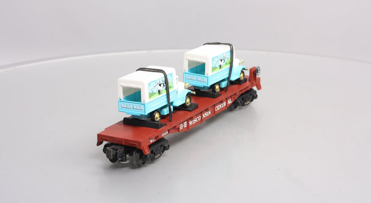 MTH 30-76116 O Gauge Wisconsin Central Flatcar With 2 Dairy Trucks  #5618 LN/Box