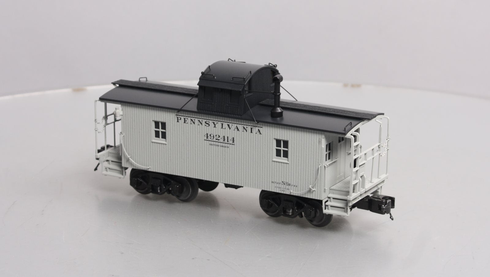MTH 20-91646 O Pennsylvania Premier N-6b Caboose w/Operating Signal Man #492414