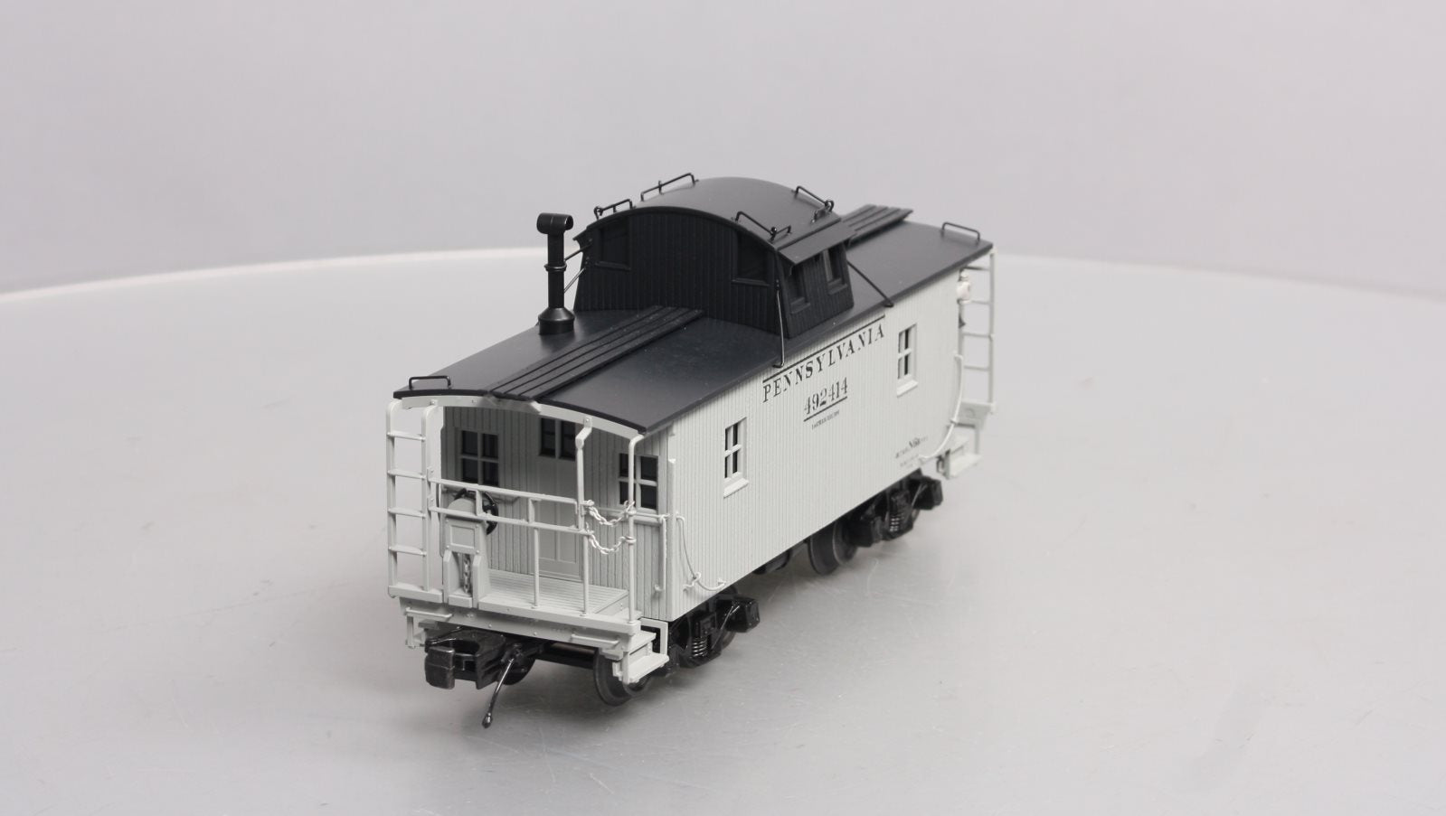 MTH 20-91646 O Pennsylvania Premier N-6b Caboose w/Operating Signal Man #492414