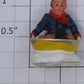 K-Line K42423-8A Skating Pond Sledding Child Figure with Yellow Sled