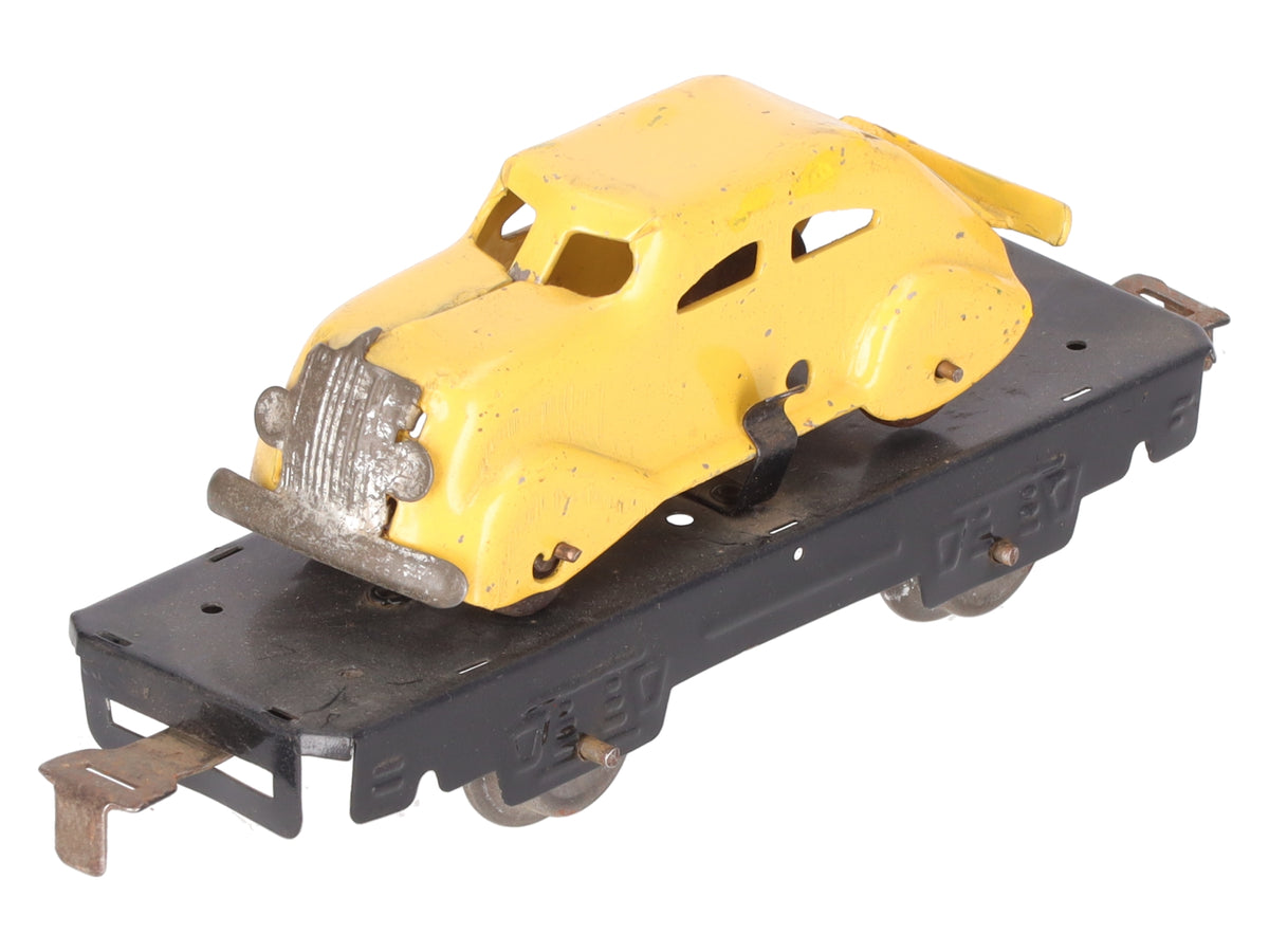 Marx 562 O Gauge Vintage Black Flatcar with Yellow Mystery Car
