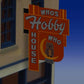 Miller Engineering 441452 HO/N Who's Hobby House Wall-Mount Animated Billboard
