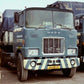 WSI 01-2262 1:50 Wiersma BV Mack F700 4x2 Classic Curtain Side Trailer-2 Axle