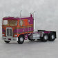 Trainworx Inc. 41053 N Salem Burgundy & Orange Kenworth K100 VIT Tractor