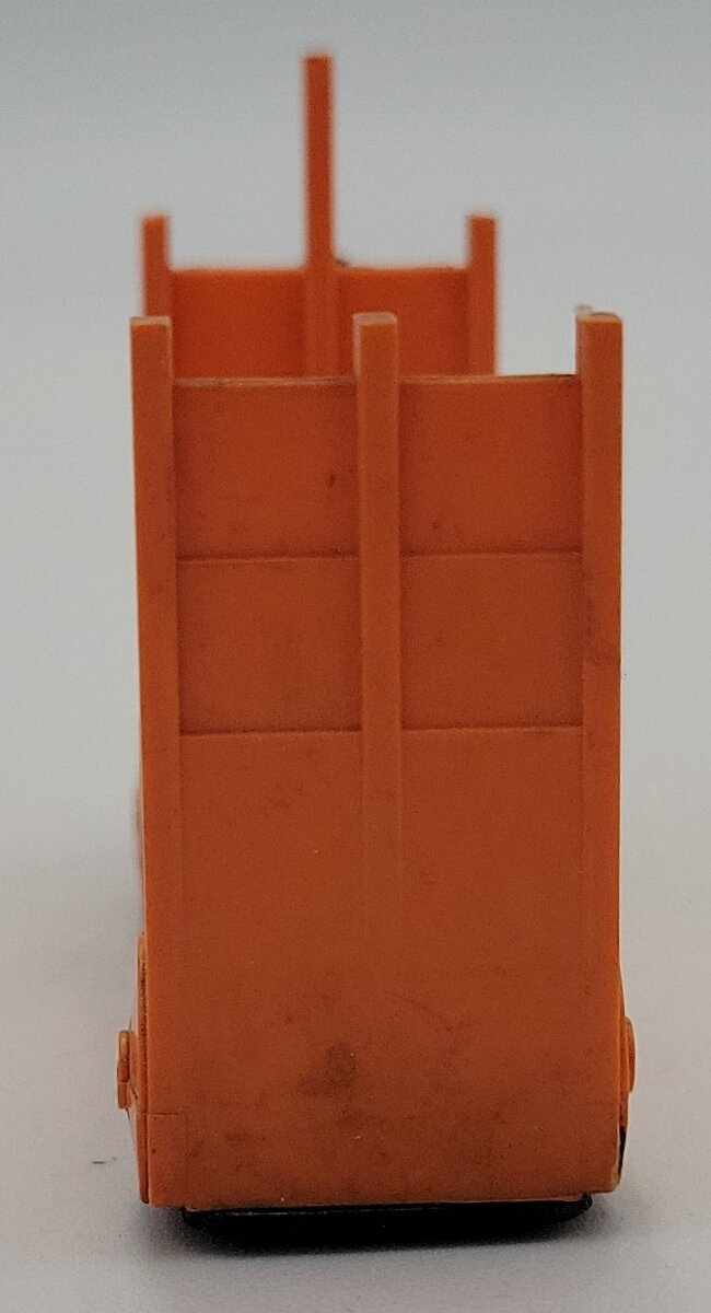 Lionel 356-35 Light Orange Baggage Cart and Unpainted Figure