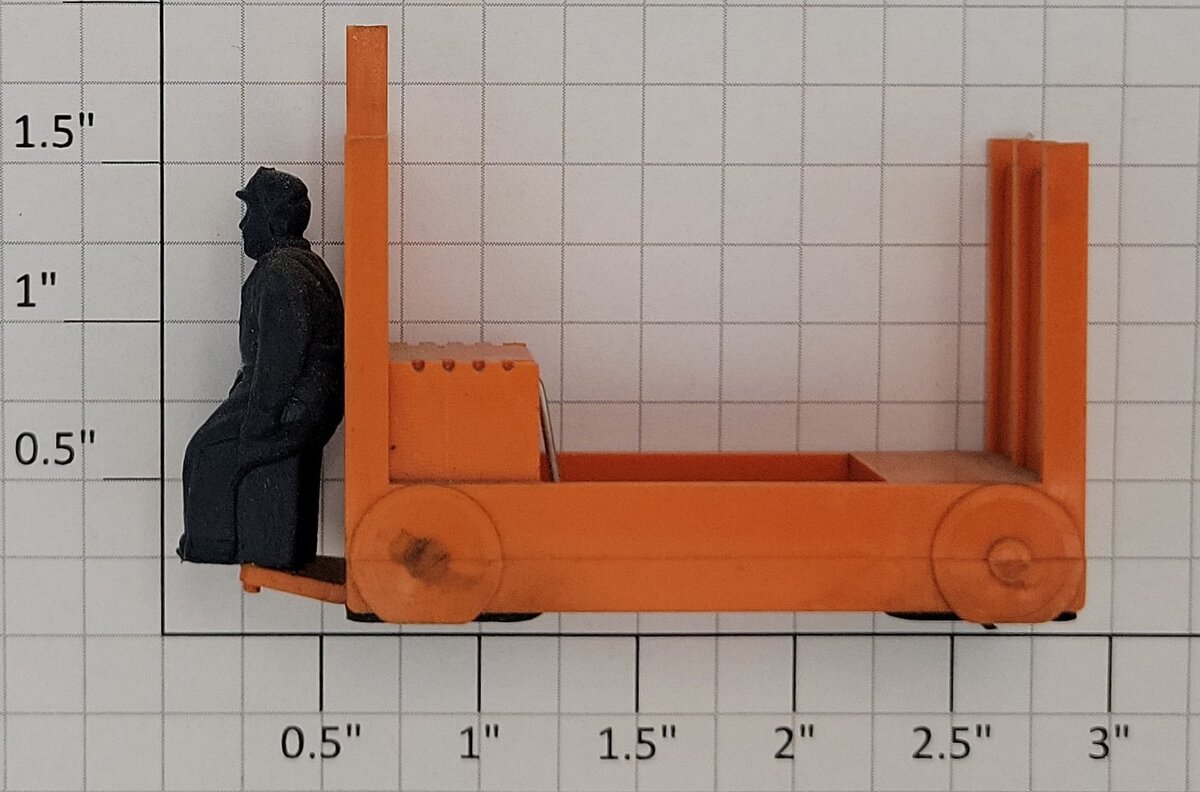 Lionel 356-35 Light Orange Baggage Cart and Unpainted Figure