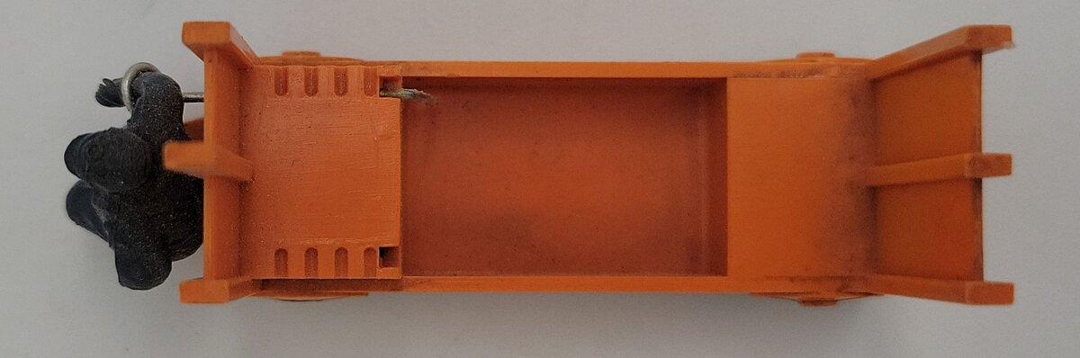 Lionel 356-35 Light Orange Baggage Cart and Unpainted Figure