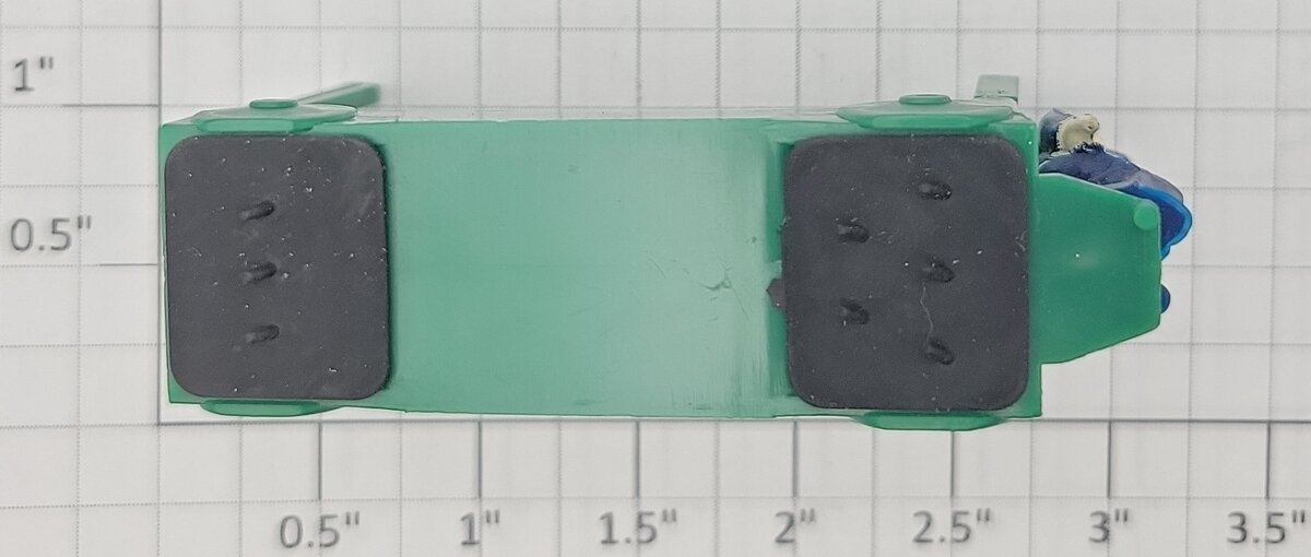 Lionel 2323-23 Dark Green Baggage Truck (Modern Design) with Painted Figure