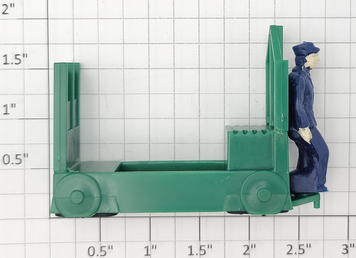 Lionel 2323-23 Dark Green Baggage Truck (Modern Design) with Painted Figure