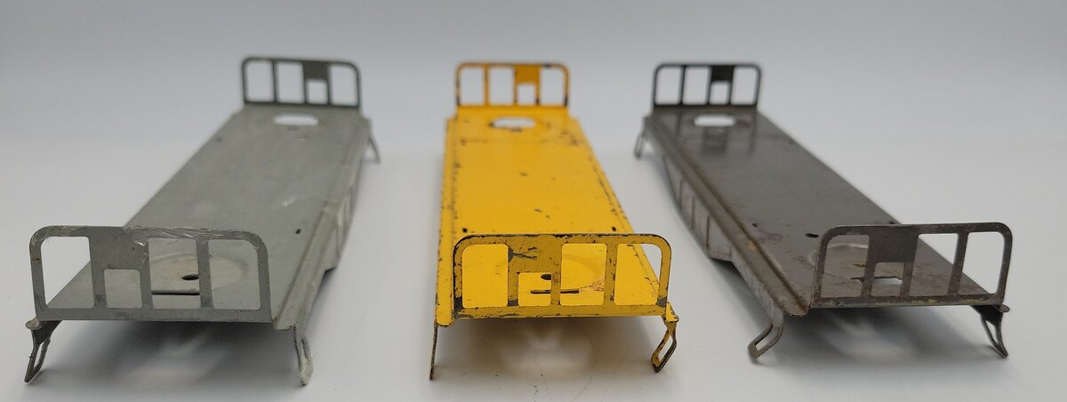 Lionel 6111-4 Metal Flat Car Frames : Light & Dark Gray , and Yellow (Set of 3)