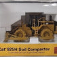 Norscot 55165 1:50 Caterpillar 825H Soil Compactor Die Cast Model Replica NIB