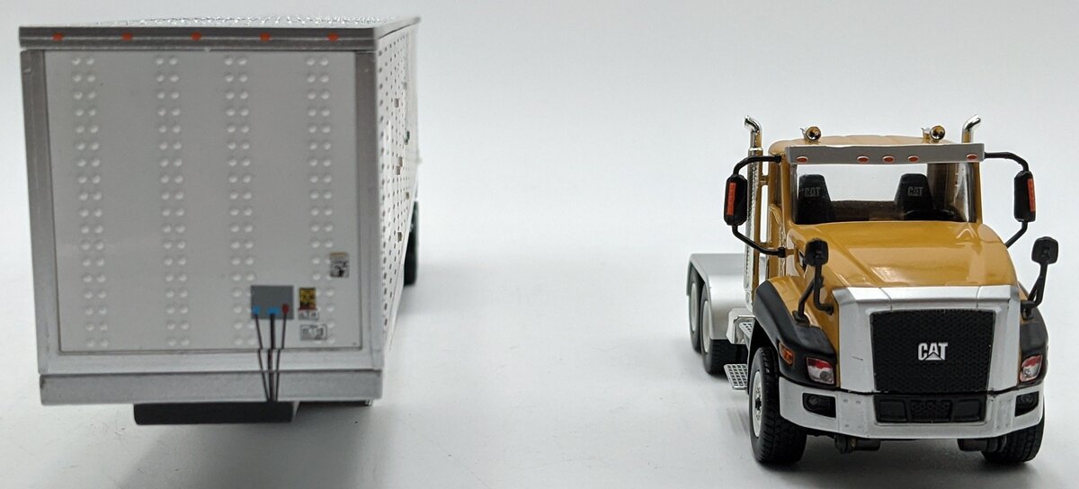 DieCast Masters 85666 1:50 Caterpillar CT660 Day Cab with Mural Dry Van Trailer