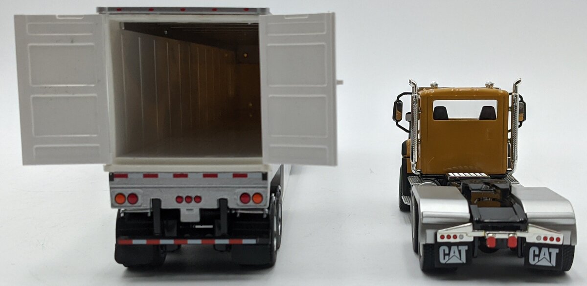 DieCast Masters 85666 1:50 Caterpillar CT660 Day Cab with Mural Dry Van Trailer