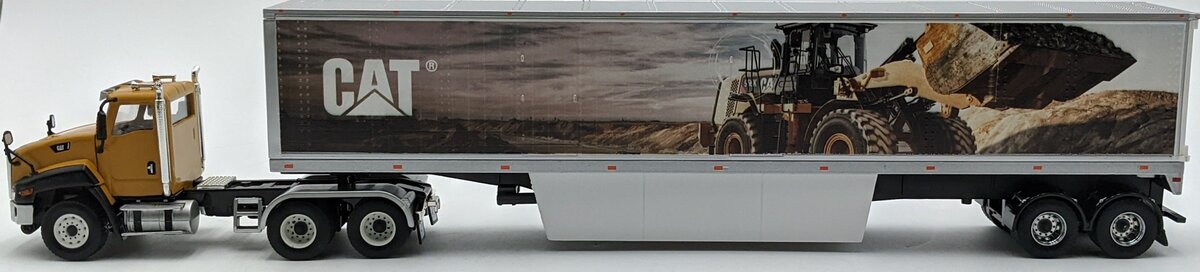 DieCast Masters 85666 1:50 Caterpillar CT660 Day Cab with Mural Dry Van Trailer