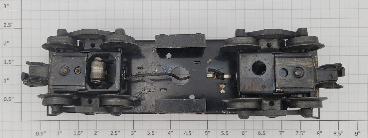 Lionel 6257-11 O Gauge Caboose Frame with Trucks, Lamp Socket, and Tool Boxes