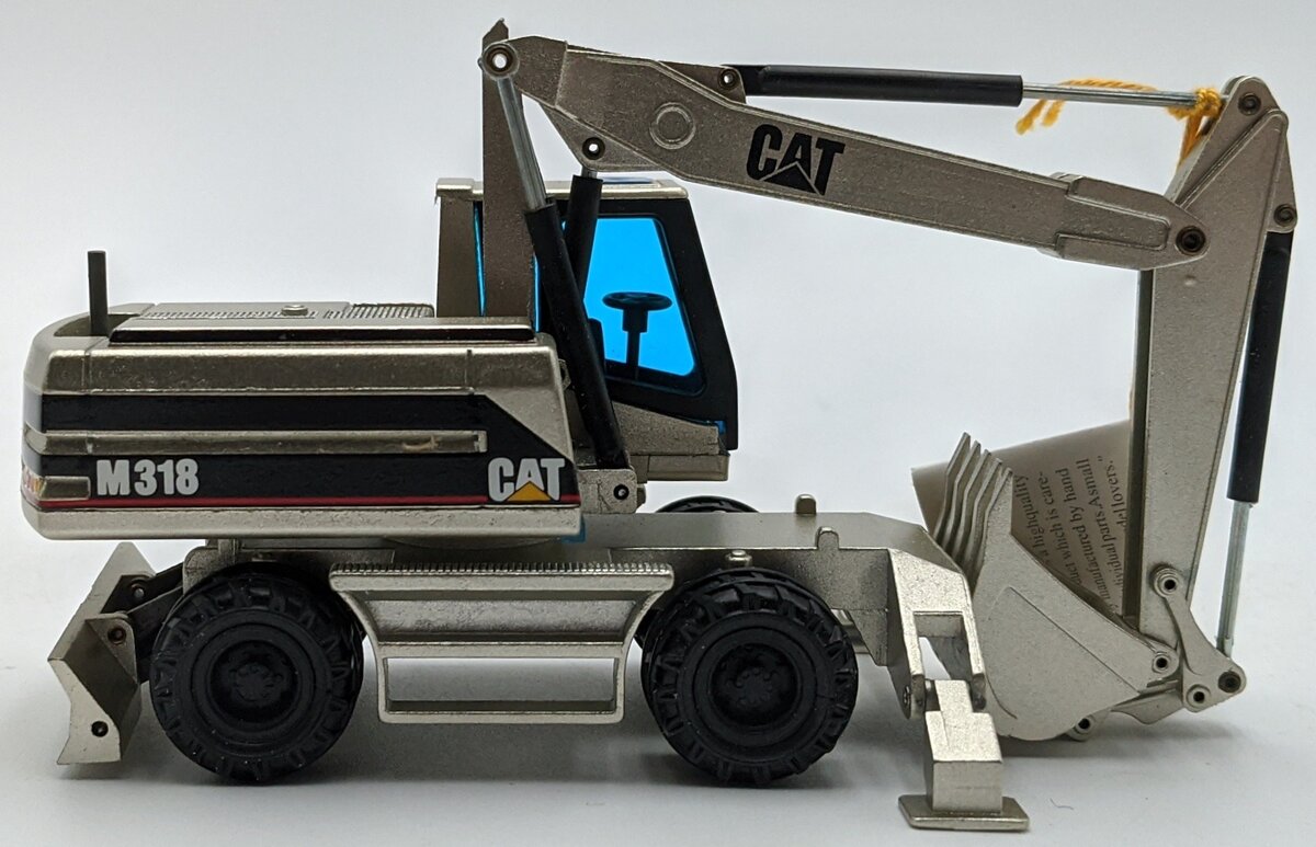 NZG 405 1:50 Caterpillar M318 Wheeled Excavator