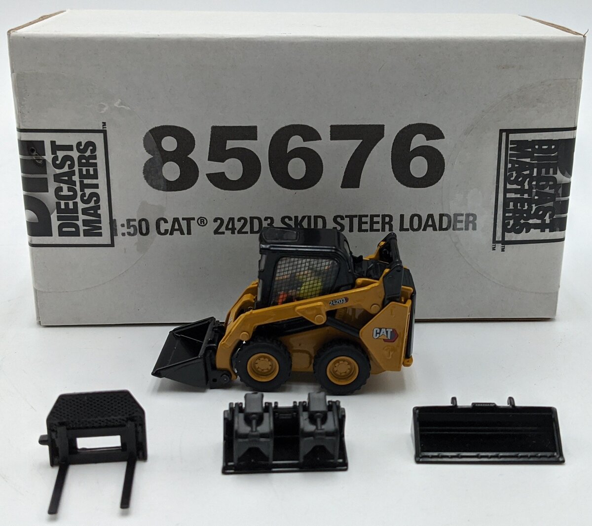 DieCast Masters 85676 1:50 Caterpillar 242D3 Skid Steer Loader with Work Tools
