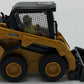 DieCast Masters 85676 1:50 Caterpillar 242D3 Skid Steer Loader with Work Tools