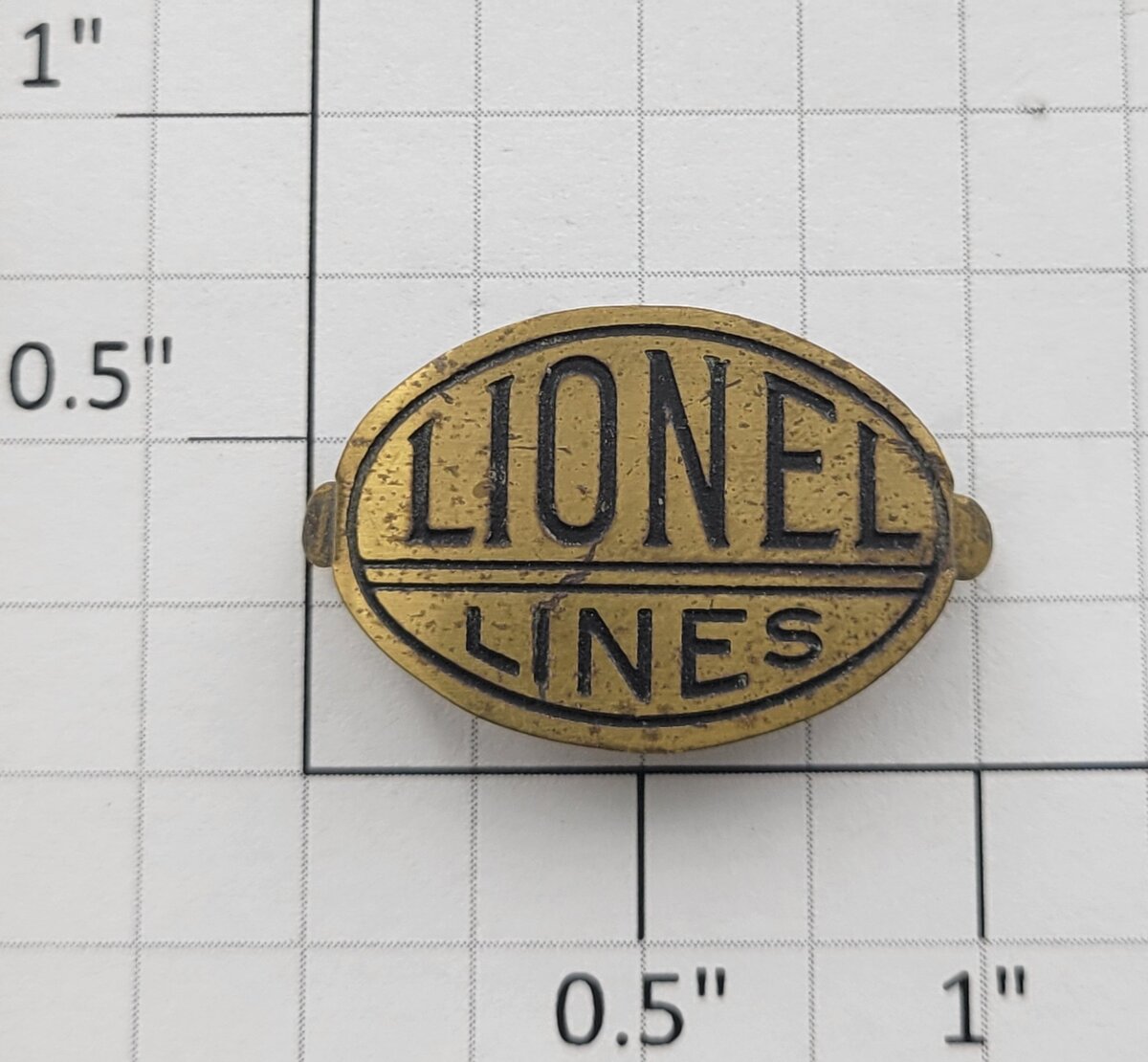 Lionel 212-8 Brass Oval Lionel Lines with Black Lettering Nameplate