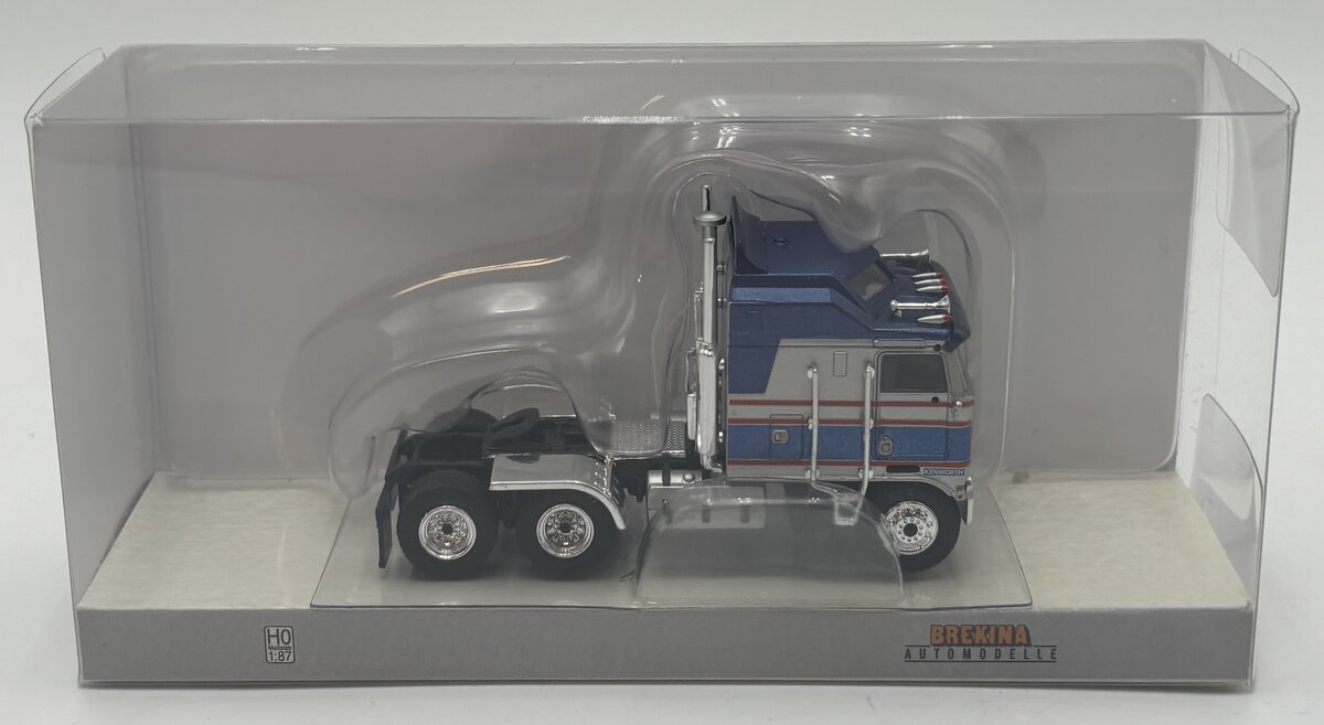 Brekina Automodelle 85741 HO Silver/Blue Kenworth K100 3-Axle Aerodyne