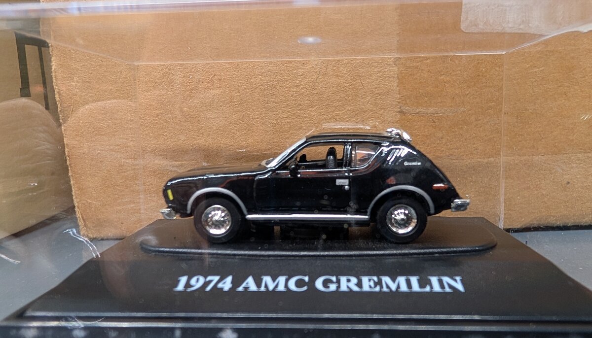 Motormax Toy 73950FC HO Fresh Cherries Black 1974 AMC Gremlin