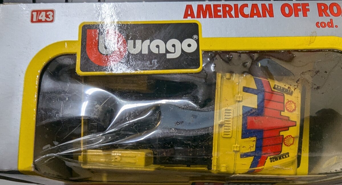 Burago 4122 1:43 American Off Road Yellow w/Red & Blue Accents Jeep Vehicle