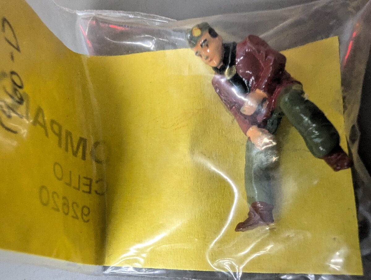 The Railmen Company 1960D O Scale Military Man w/Red Jacket Sitting