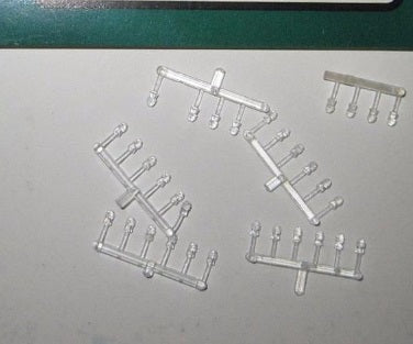 San Juan Car Co 5001 O and On3 Telephone Pole Insulators in Clear Plastic