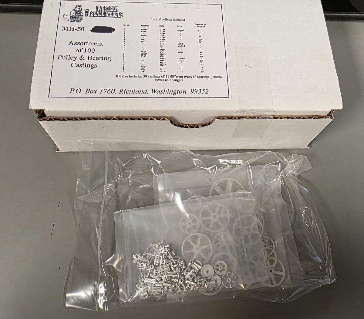 Western Scale Models MH-50 HO Assortment of 100 Pulley and Bearing Castings