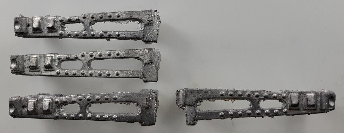 Acme 1217-002 4-Piece Unfinished Diecast Truck Frame Castings (Bag of 4)